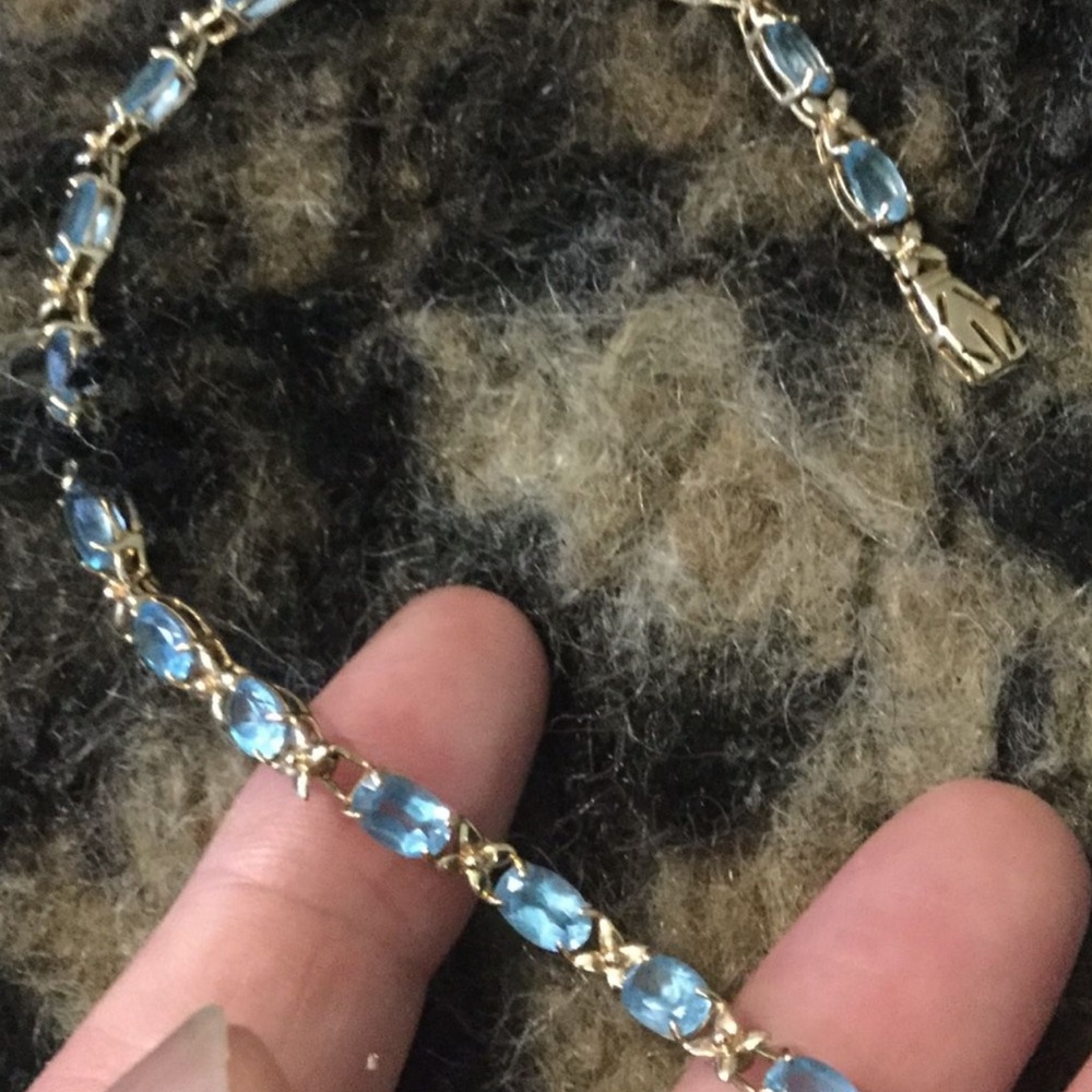 10k 
yellow gold xox topaz bracelet